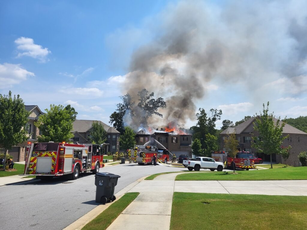 Firefighters battle house fire and high afternoon temps on Tuesday ...
