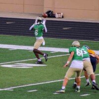 Buford's Jameer Cantrell catches a throw by Micah Johnson. Photo by Alicia Payne