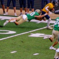 Buford's Colton Pope brings down a Marist player. Photo by Alicia Payne