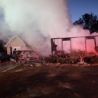 Fire crews battle a residential fire in Buford on Jan. 21, 2024. Photo courtesy of Gwinnett County Fire and Emergency Services.