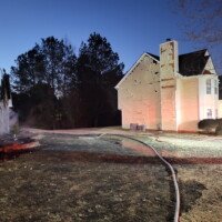 Fire crews battle a residential fire in Buford on Jan. 21, 2024. Photo courtesy of Gwinnett County Fire and Emergency Services.