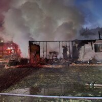 Fire crews battle a residential fire in Buford on Jan. 21, 2024. Photo courtesy of Gwinnett County Fire and Emergency Services.