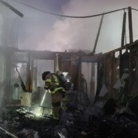 Fire crews battle a residential fire in Buford on Jan. 21, 2024. Photo courtesy of Gwinnett County Fire and Emergency Services.