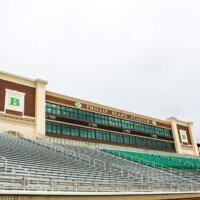 A view of the home side of Phillip Beard Stadium including the massive press box and luxury suites.